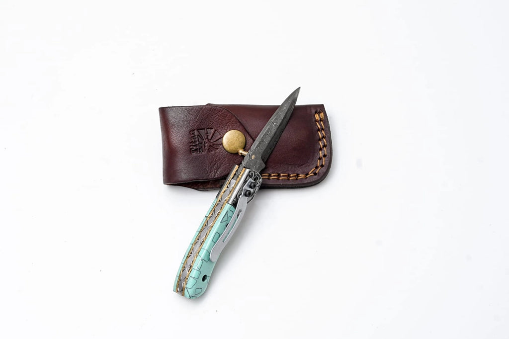 Turquoise Damascus Folding Knife – Hand Engraved Bolster Edition